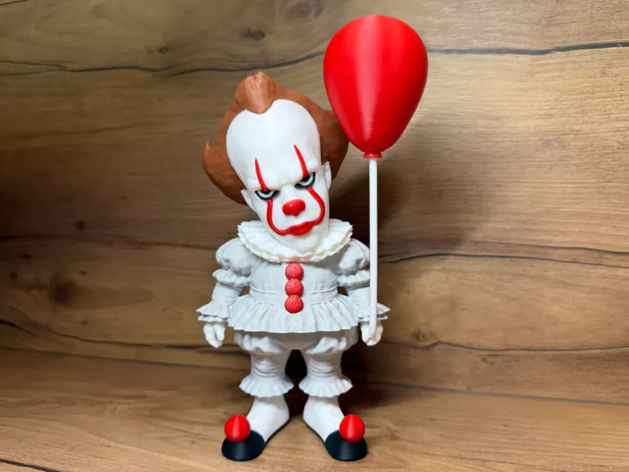 Figurine de clown horrifique avec ballon